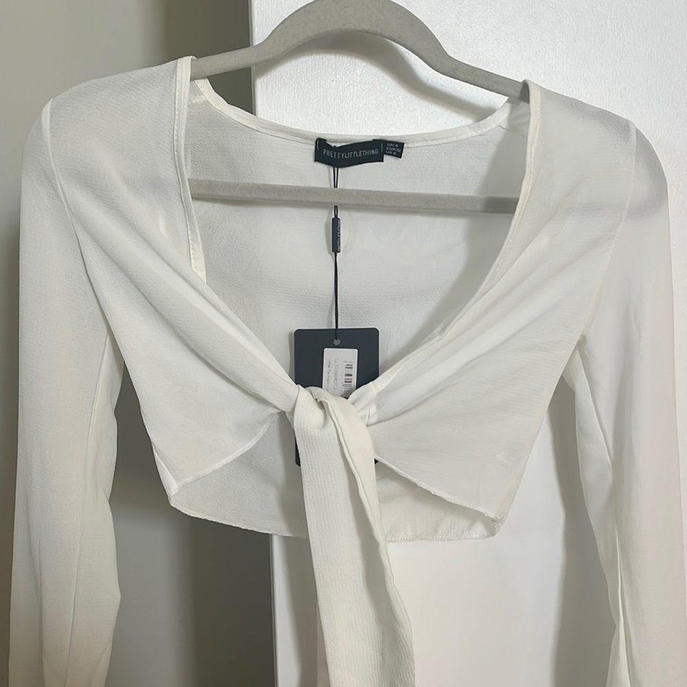 White crepe tie front crop with bell sleeve